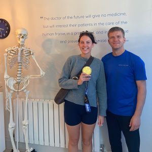 Participant Orla and therapist Loic after her post-marathon recovery